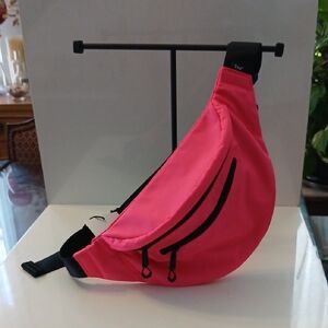 Vibrant Pink Crossbody Bag with Black Zippers Details